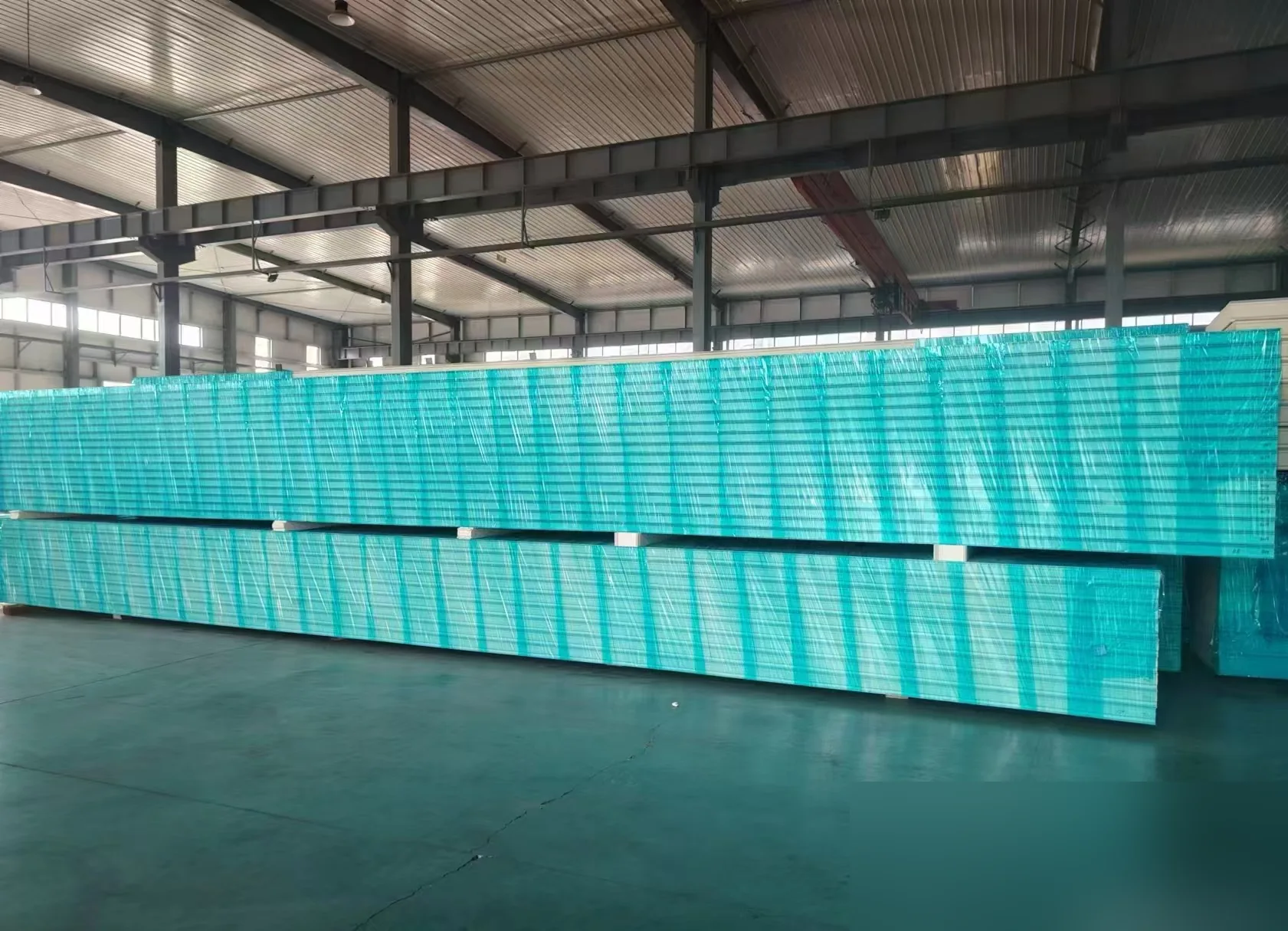Insulated sandwich panel stack in factory for quality review