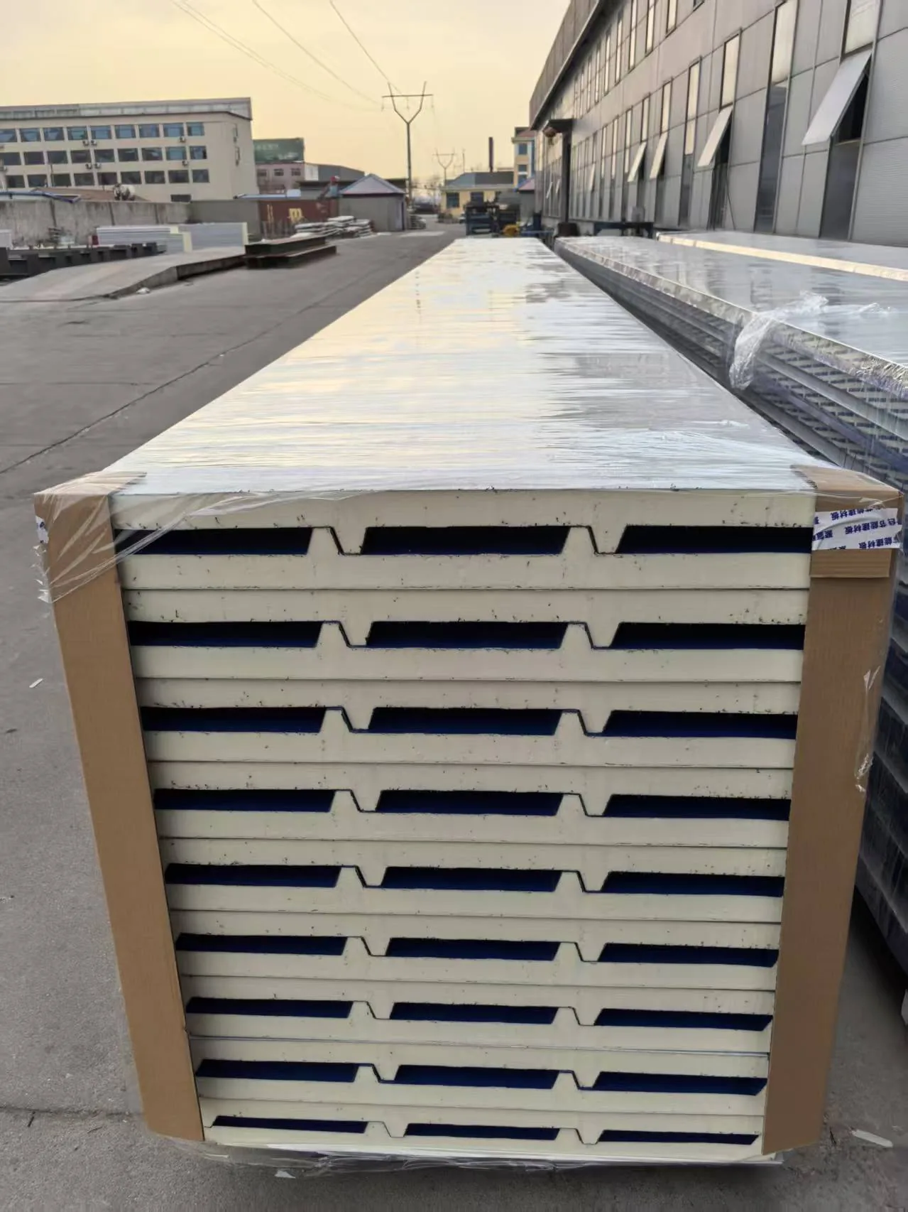 PU-edge sealed rock wool roof panels bundled and banded for export